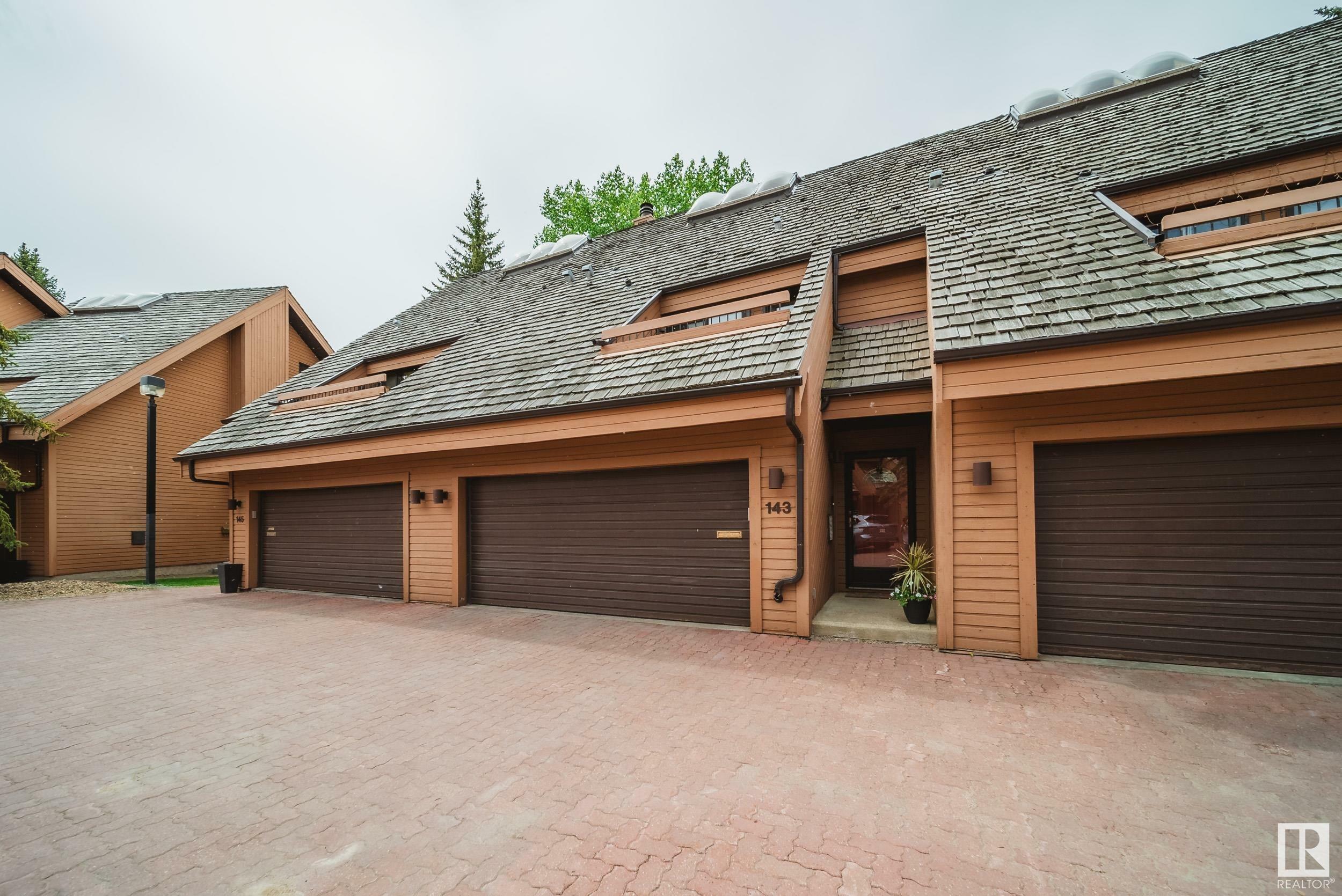 Property Photo:  143 Wolf Willow Crescent NW  AB T5T 1T1 