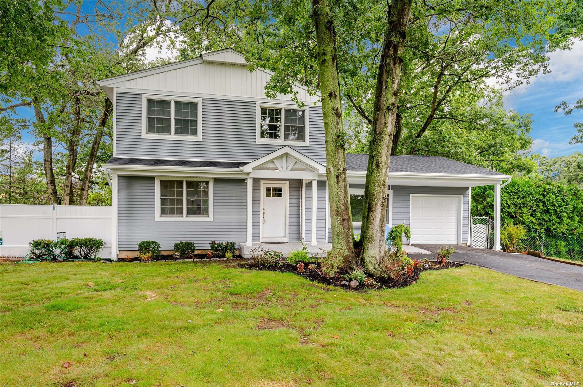 Property Photo:  5 Lilac Lane  NY 11776 