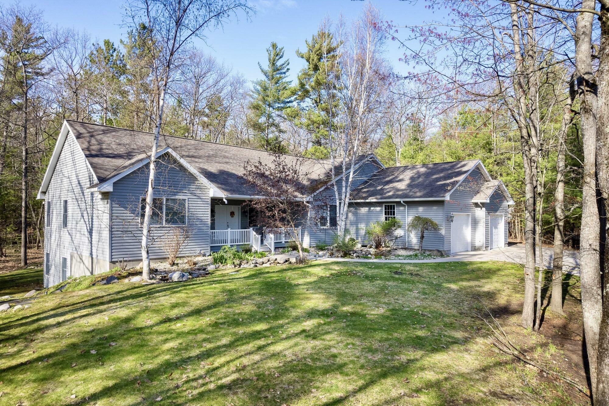 Property Photo:  6760 Chippewa Trail  MI 49749 