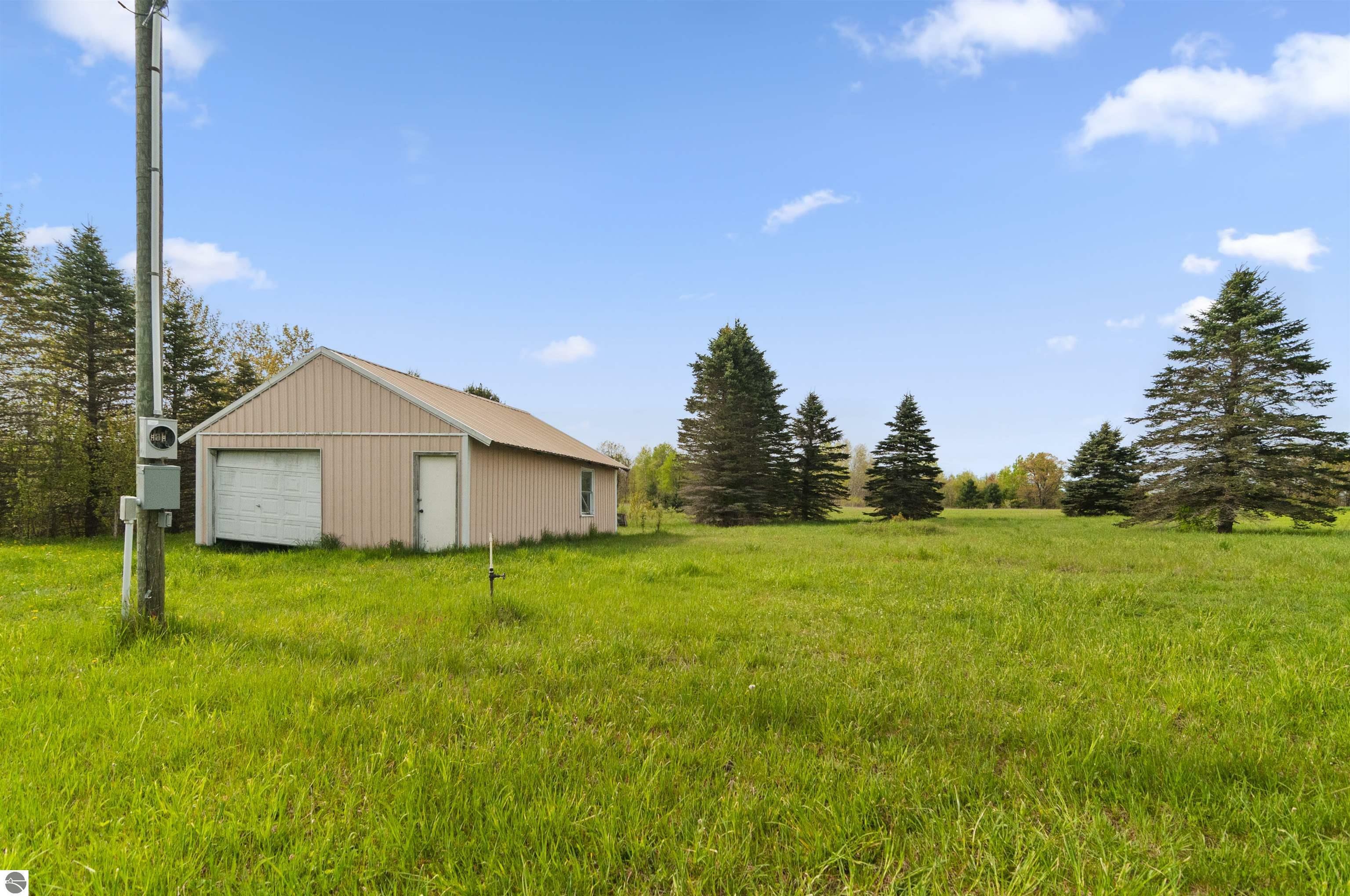 Property Photo:  2153 17 Mile Road  MI 49665 