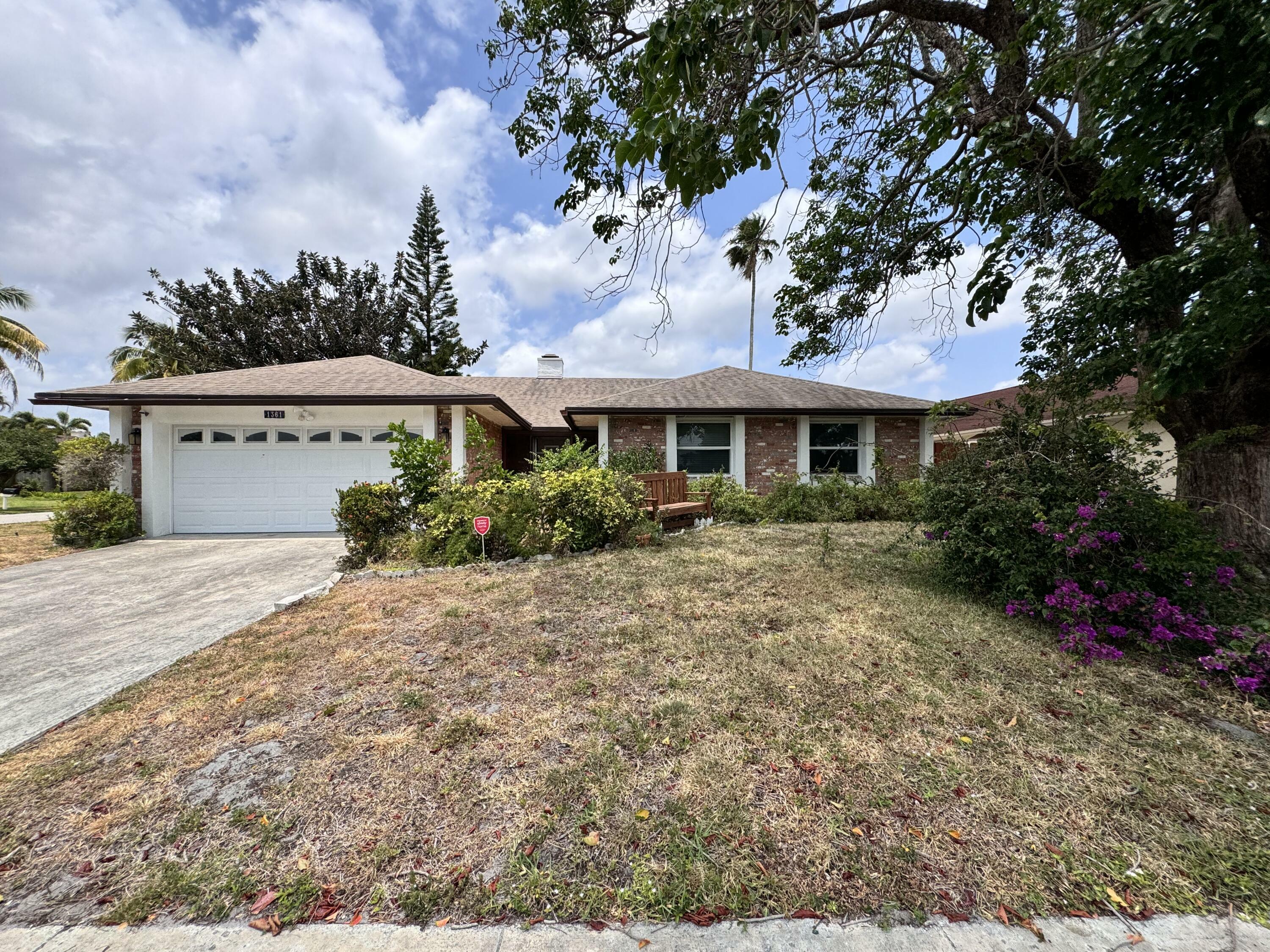 Property Photo: 1361 SW 26th Avenue FL 33442
