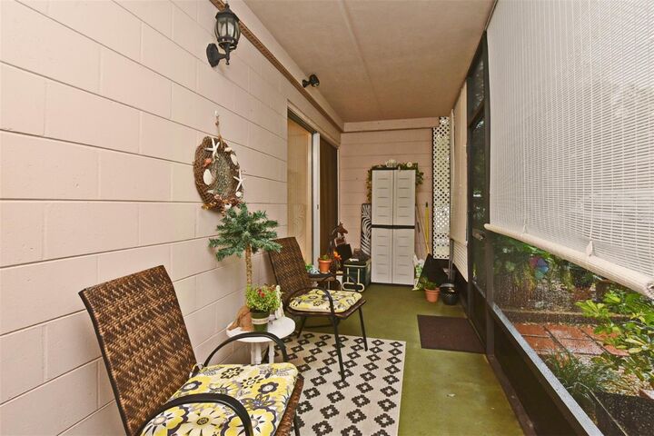Property Photo:  170 Palmetto Woods Court 1C  FL 32725 