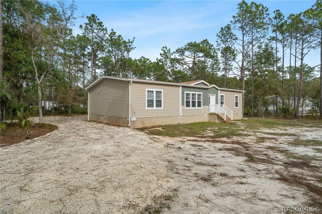 Property Photo:  2961 S Woodbine Avenue  FL 34448 