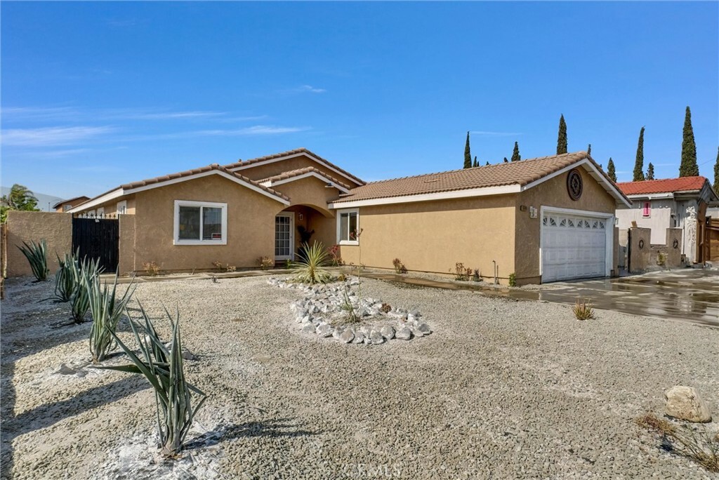 Property Photo:  15010 Arrow Boulevard  CA 92335 