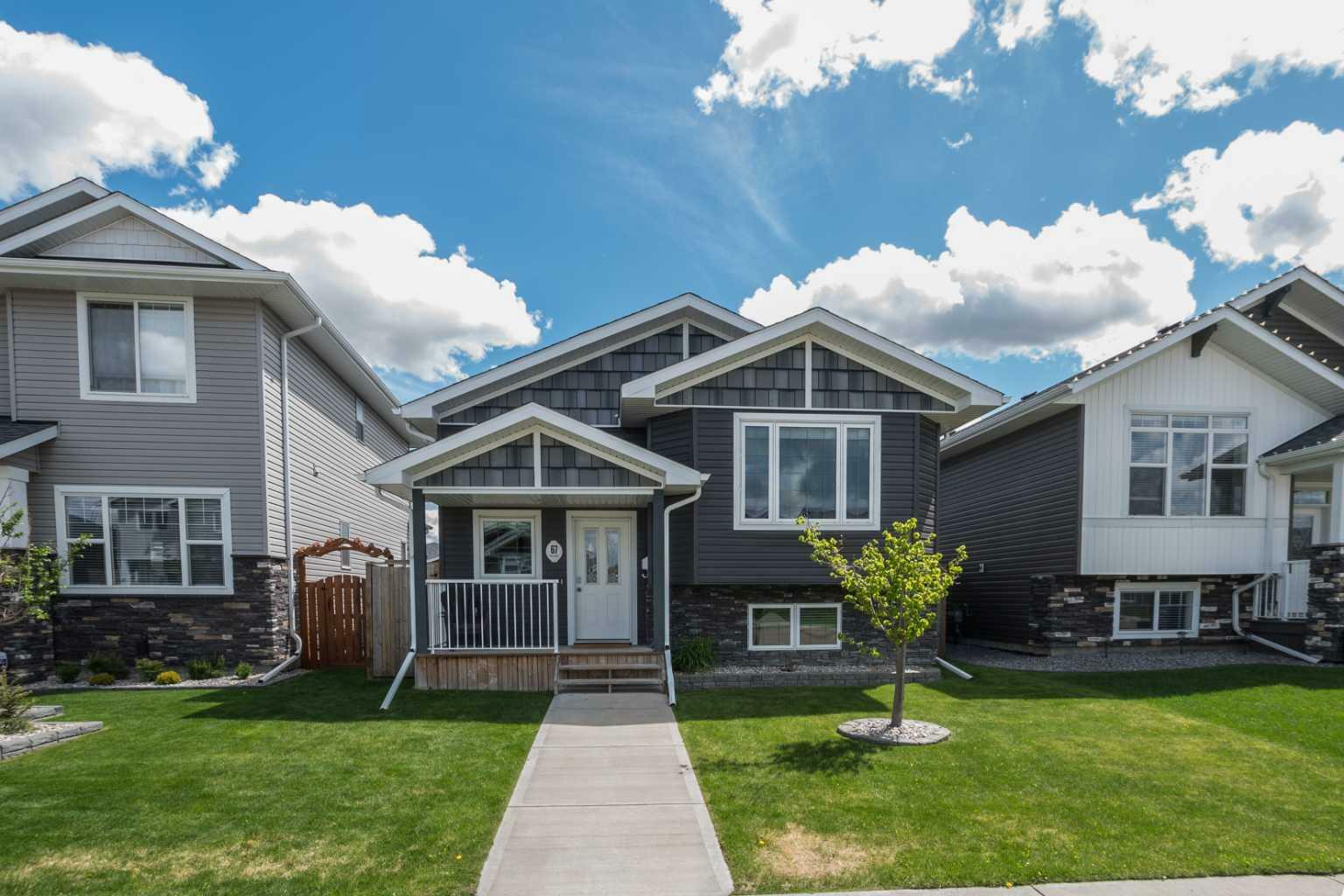 Property Photo: 67 Village Crescent AB T4R 0P2