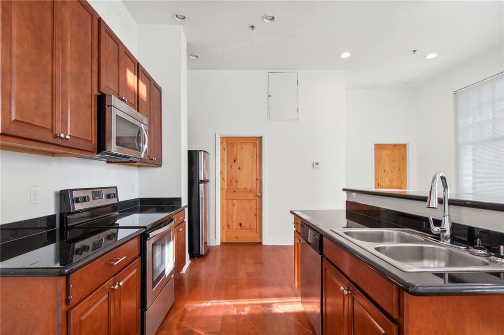 Property Photo:  703 Carondelet Street 209  LA 70113 