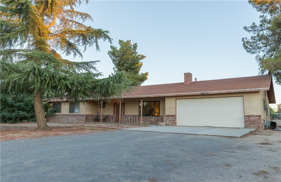 Property Photo:  16073 Muscatel Street  CA 92345 