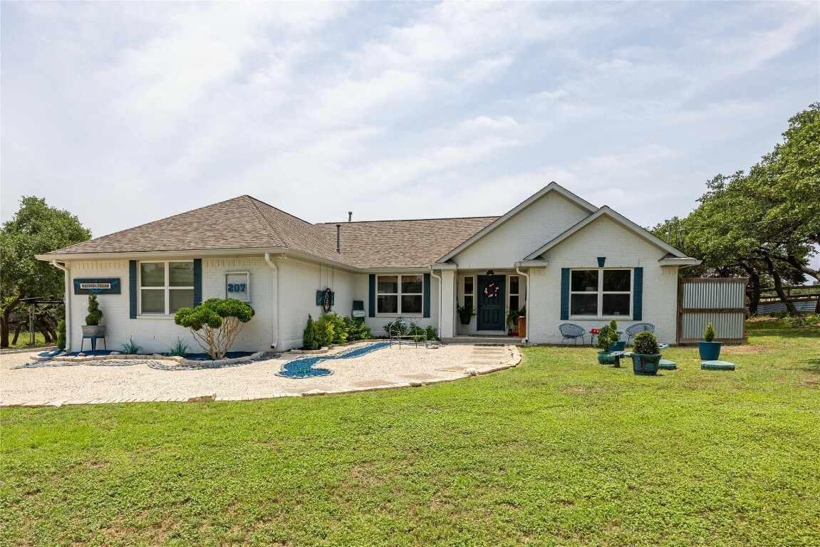 Property Photo:  207 Round Rock Road  TX 78676 