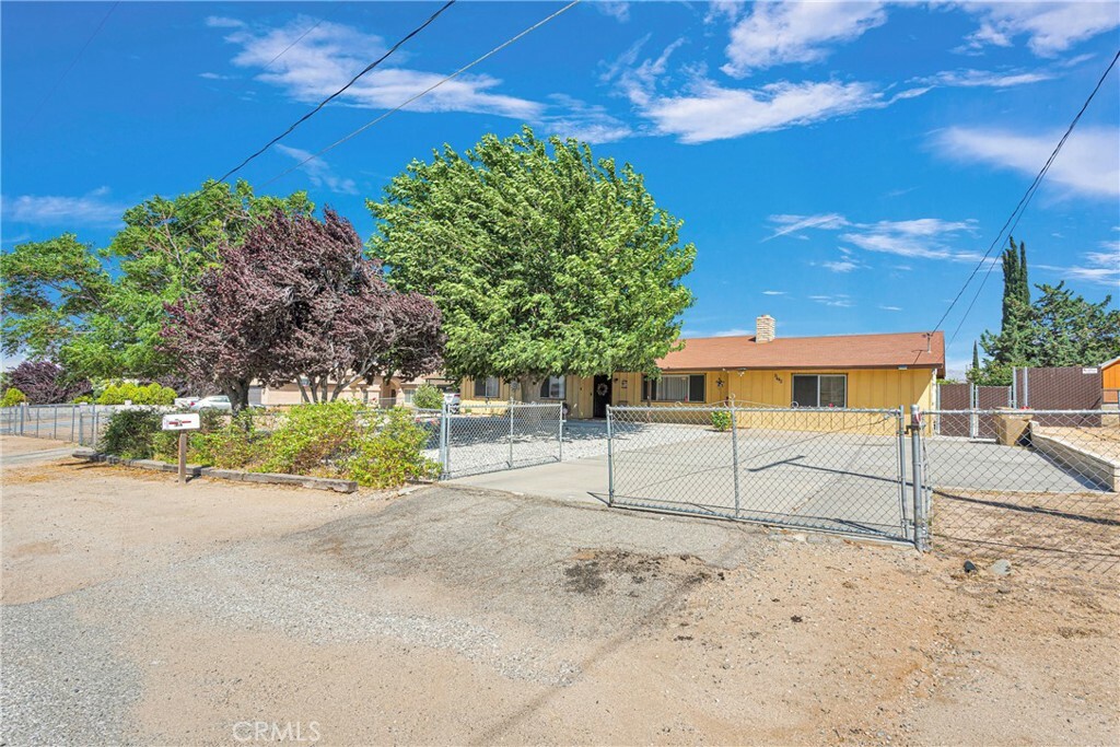 Property Photo:  9445 Grapefruit Avenue  CA 92345 