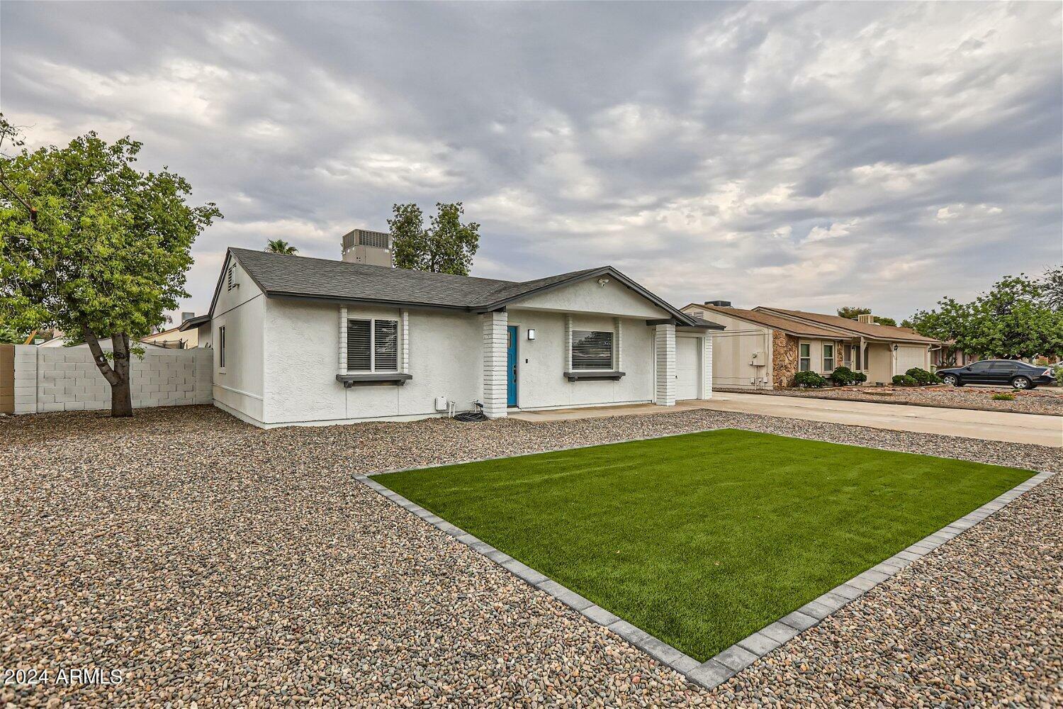 Property Photo:  6620 W Cholla Street  AZ 85304 