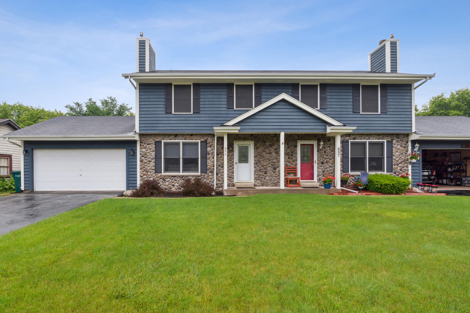 Property Photo:  695 N Dries St  WI 53080 