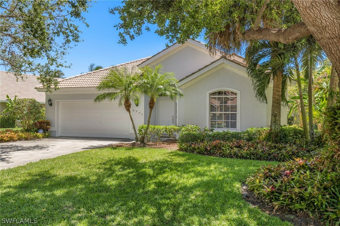 Property Photo:  6773 Southern Oak Court  FL 34109 