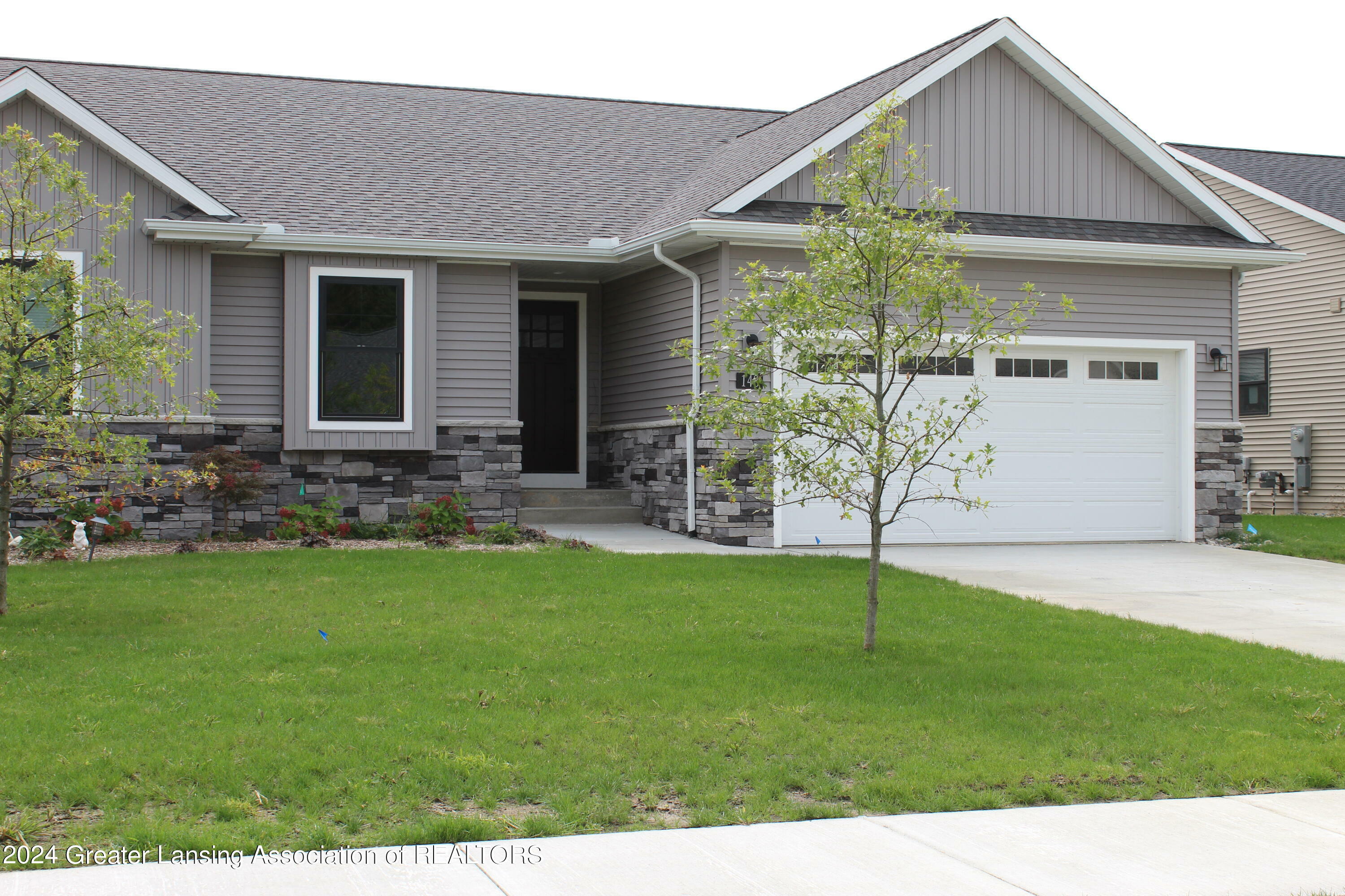 Property Photo:  302 Vansickle Drive  MI 48813 