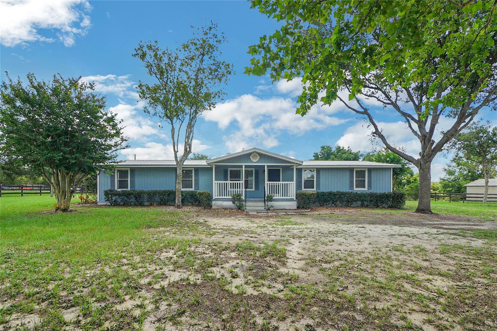 Property Photo:  5735 Marion County Road  FL 32159 