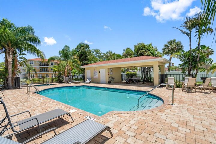 Property Photo: 5089 Royal Palms Way 202 FL 34652