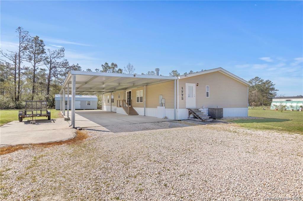 Property Photo:  1775 Ira Breaux Road  LA 70615 