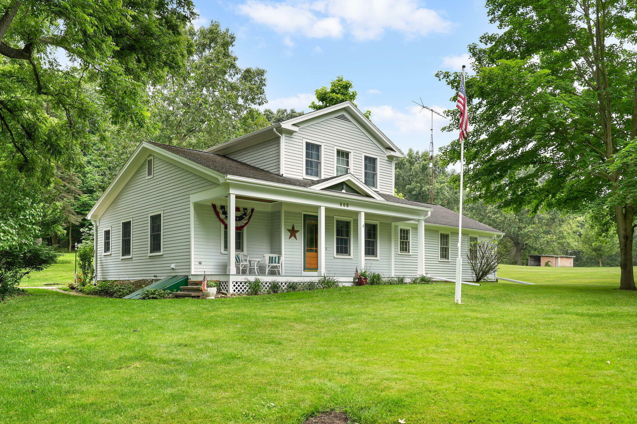 Property Photo:  665 W Main Street  MI 48158 