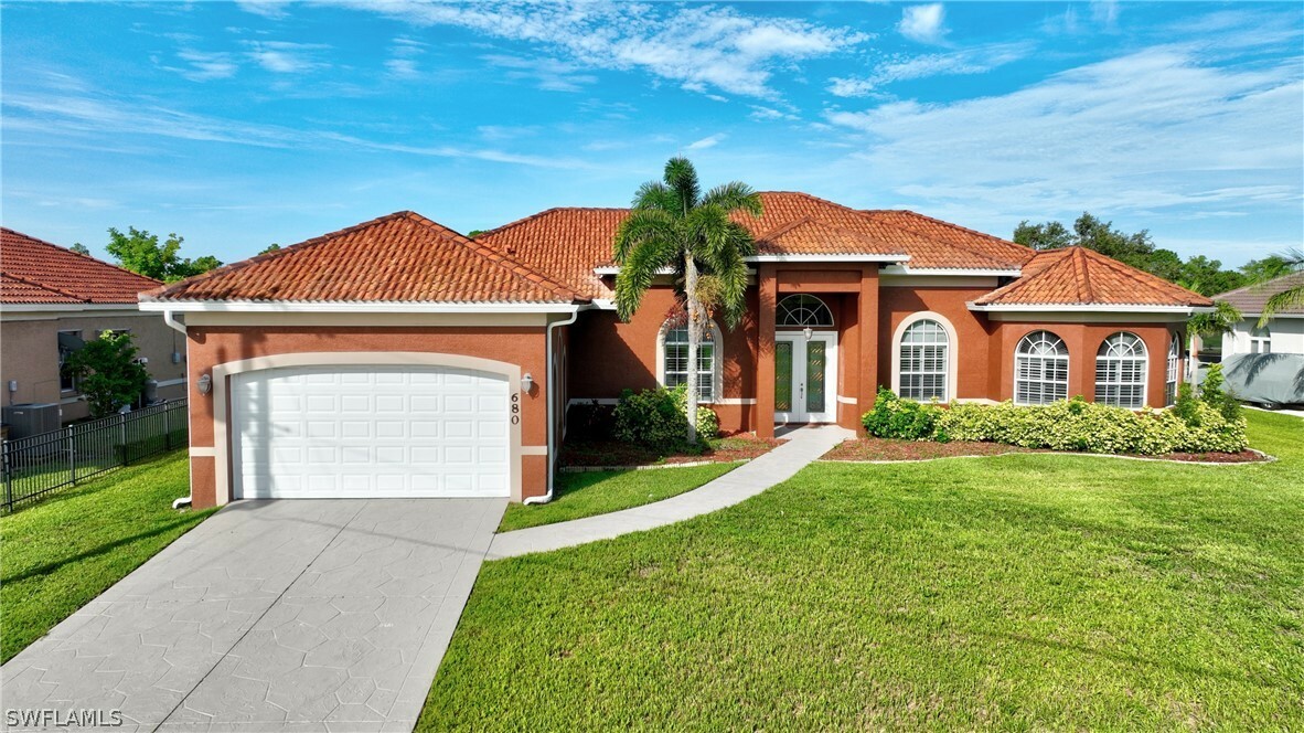 Property Photo:  680 Mirror Lakes Court  FL 33974 