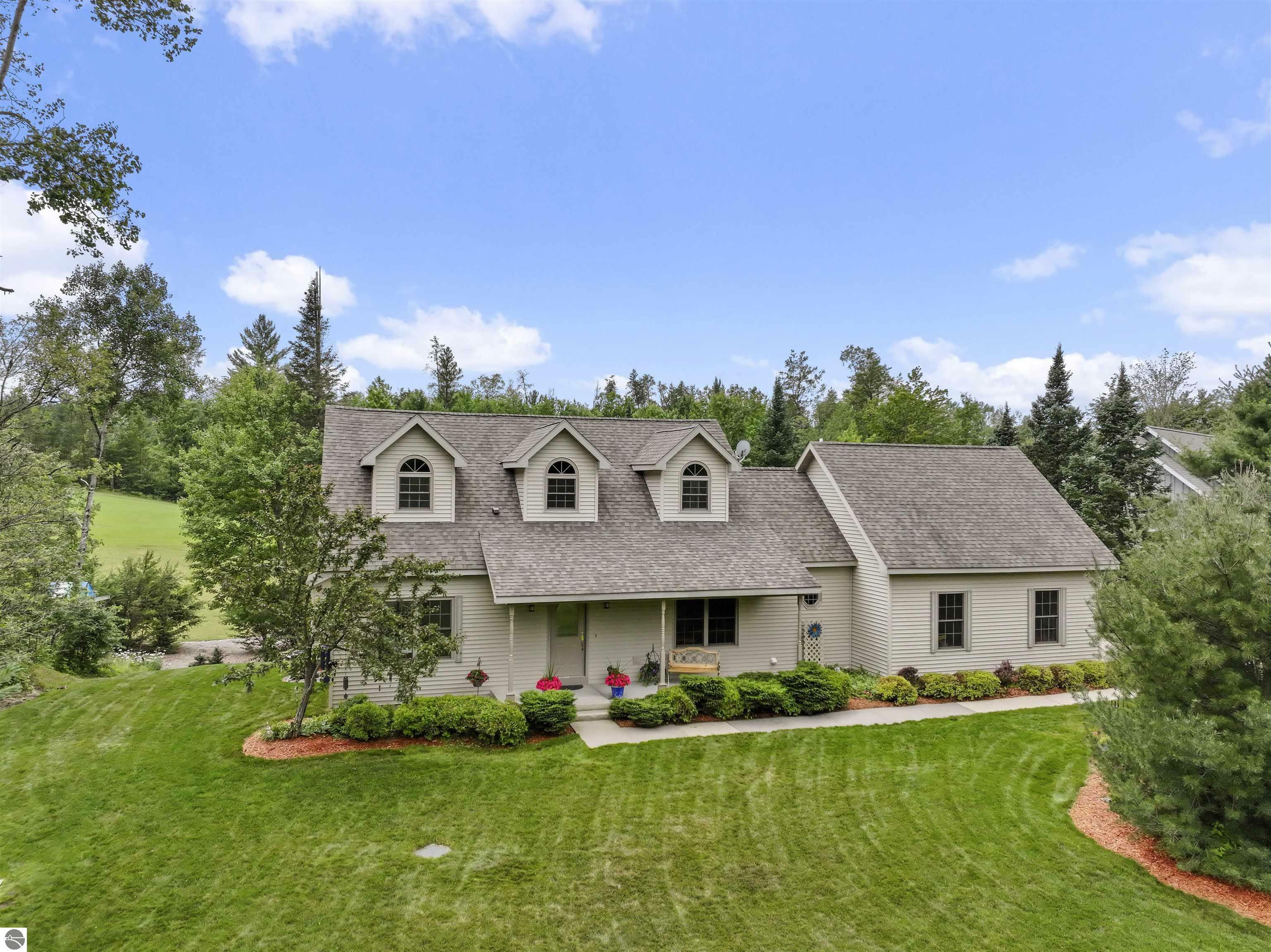 Property Photo:  627 White Pine Drive  MI 49601 