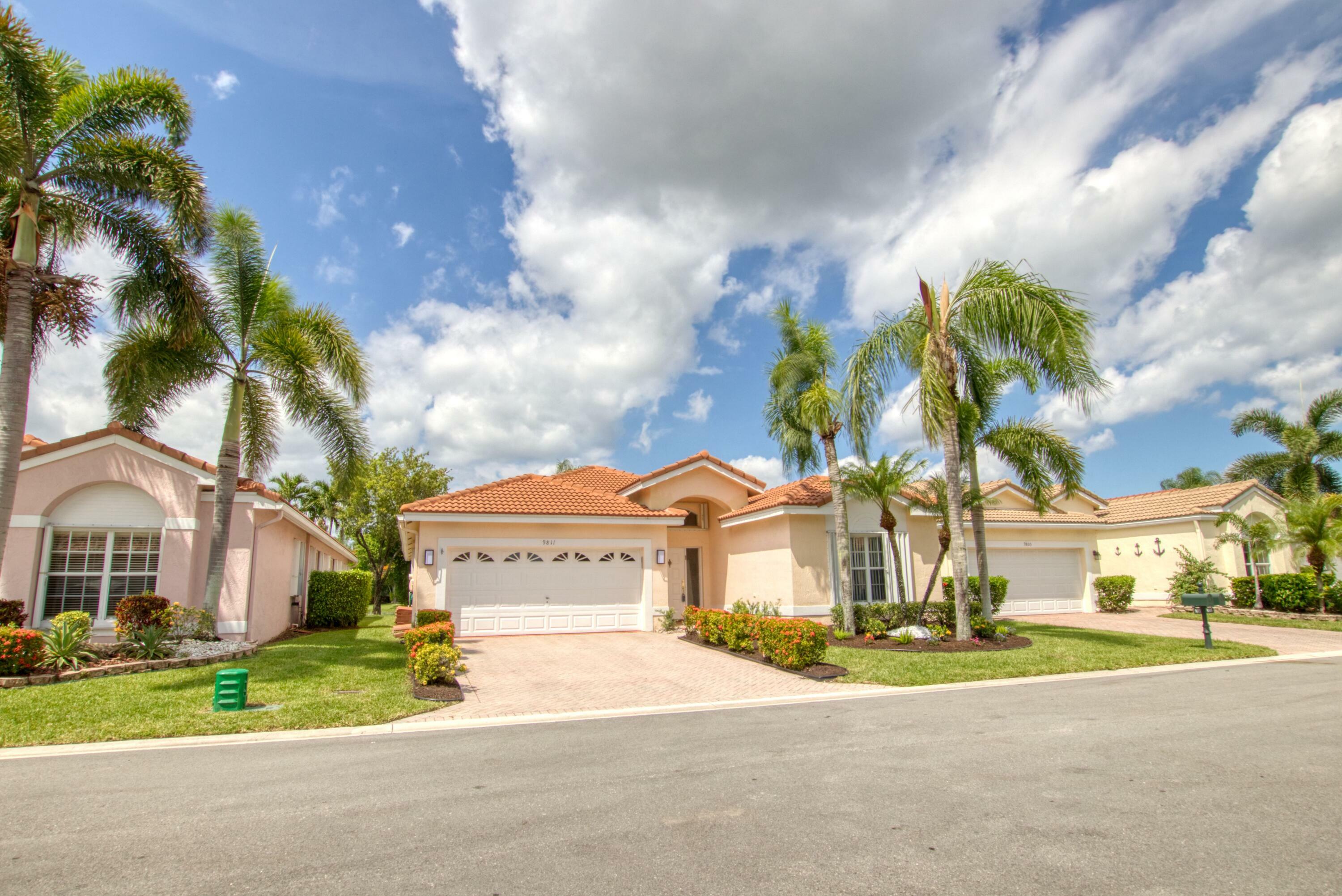 Property Photo:  9811 Lemonwood Court  FL 33437 