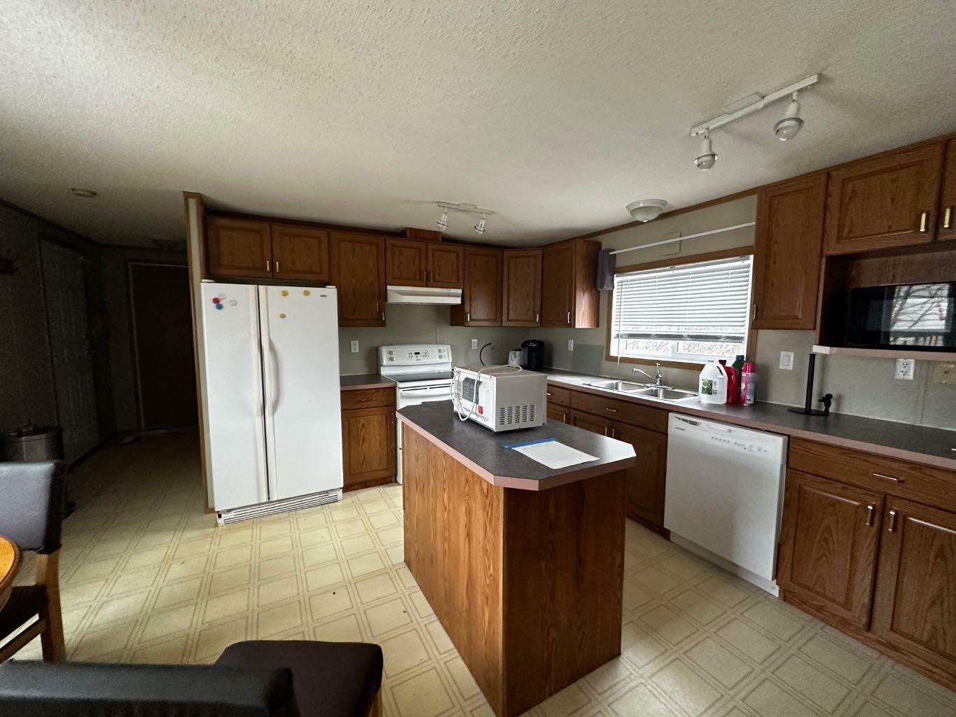 Property Photo:  116 Cokerill Crescent  AB T9K 2J3 