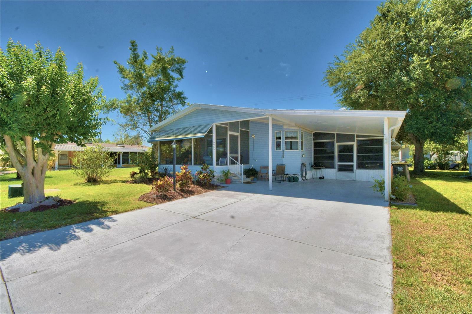 Property Photo:  6066 Southern Oaks Drive SE  FL 33884 