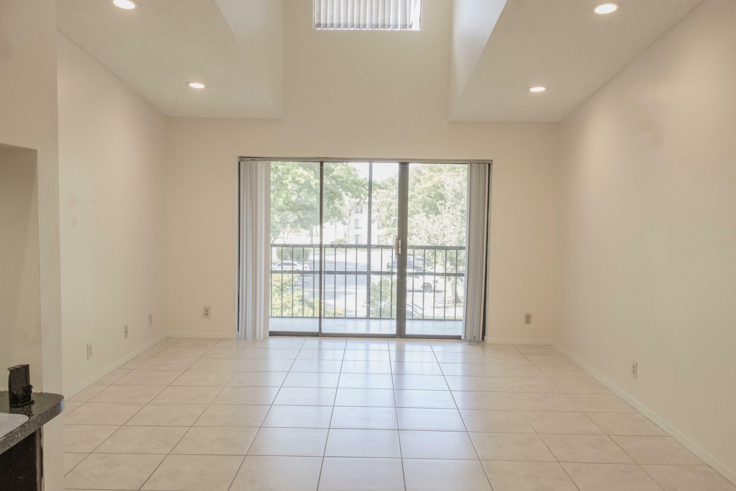 Property Photo:  209 Foxtail Drive H3  FL 33415 