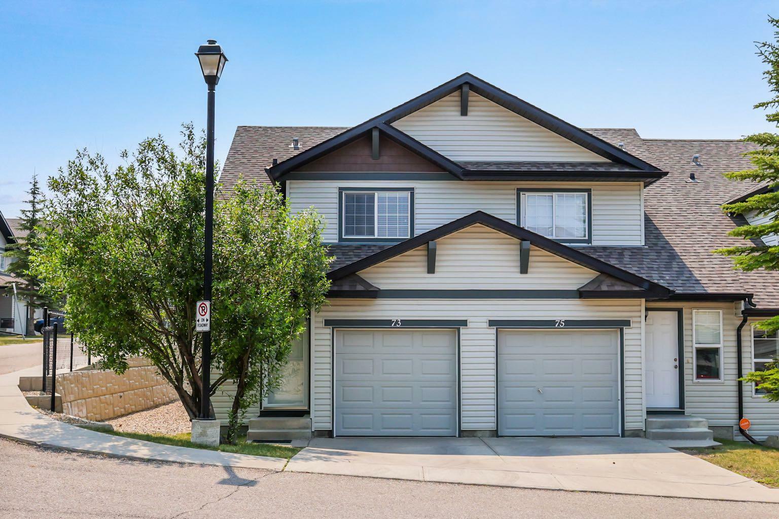 Property Photo: 73 Panatella Villas NW AB T3K 0G6
