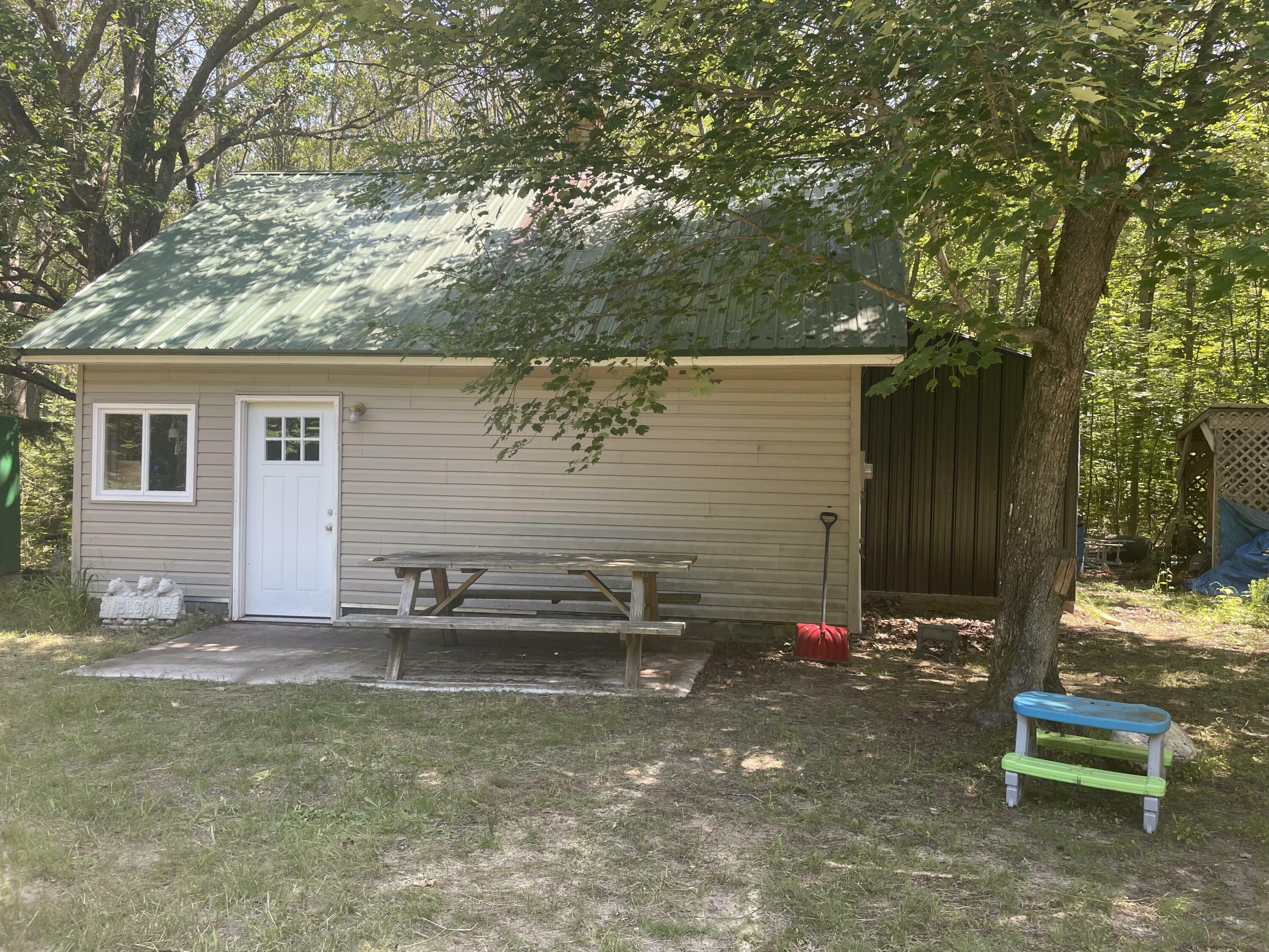 Property Photo:  8582 E Sand Ridge Rd  MI 49736 