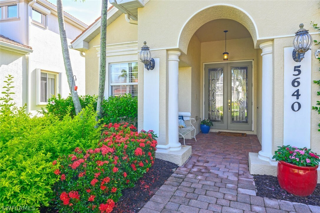 Property Photo:  5640 Lago Villaggio Way  FL 34104 