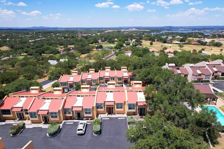 Property Photo:  402 Hi Stirrup E4  TX 78657 