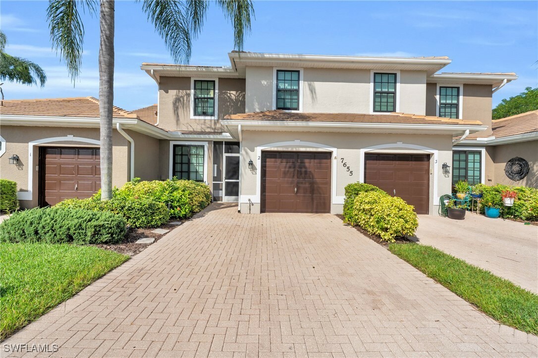 Property Photo:  7655 Meadow Lakes Drive 1002  FL 34104 