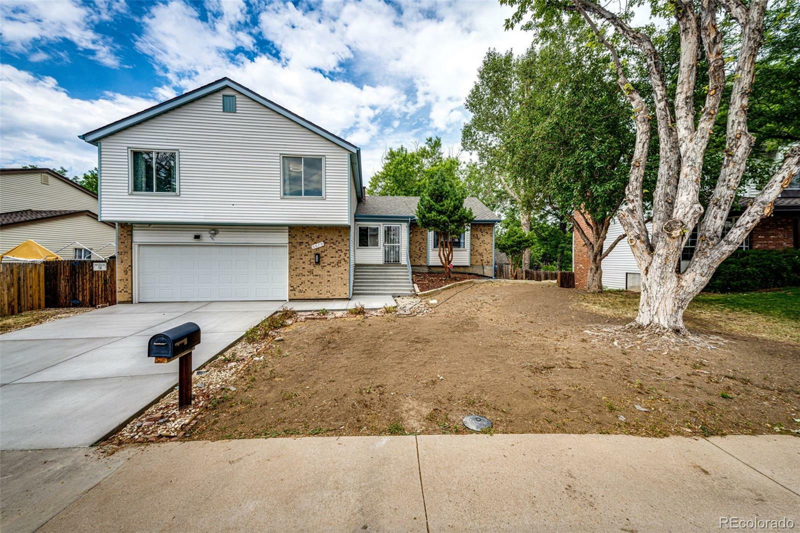 Property Photo:  3679 S Zeno Way  CO 80013 