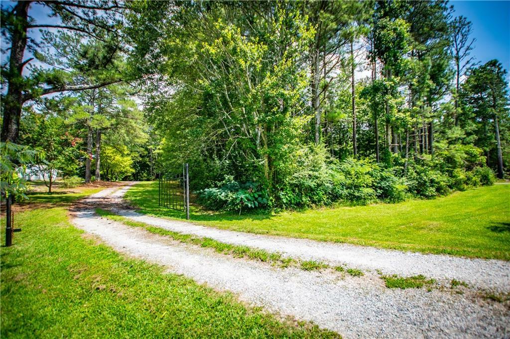 Property Photo:  6919 Mount Zion Road  GA 30182 