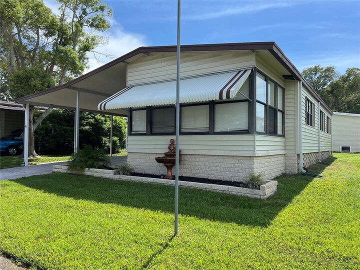 Property Photo:  84 Red Fox Run 7  FL 34695 