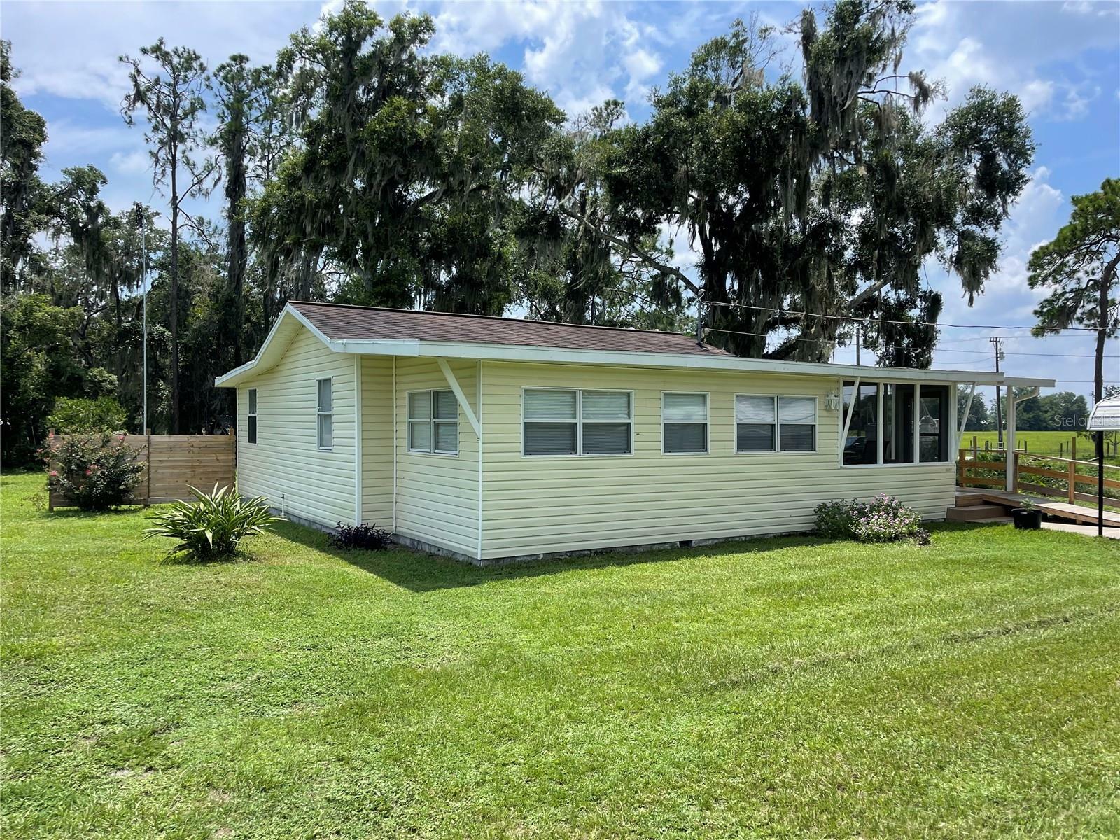 Property Photo:  1217 County Road 464  FL 33538 