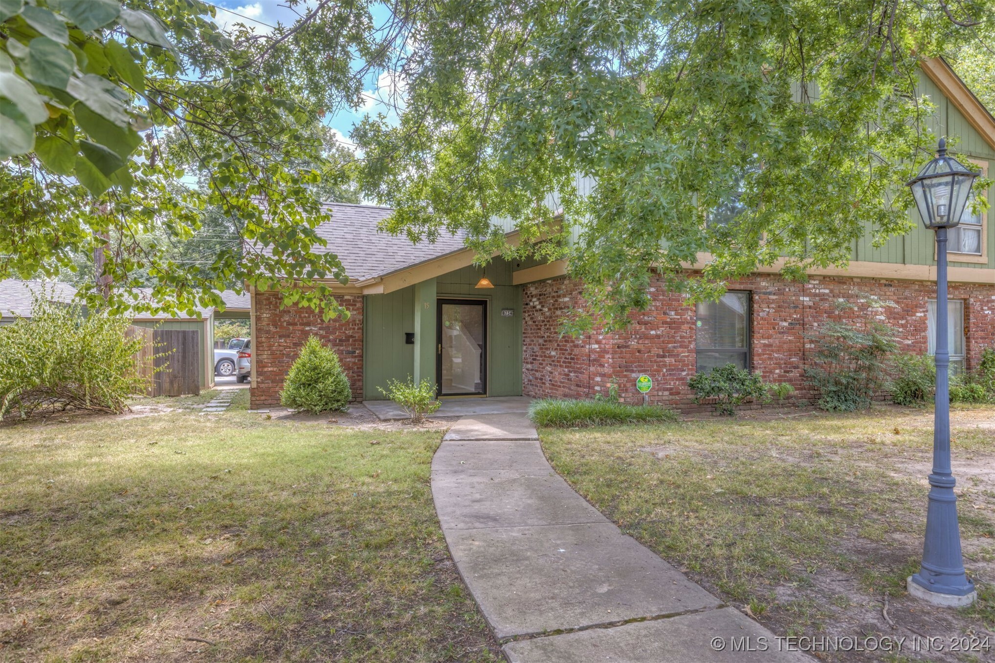 Property Photo:  8734 E 27th Street 15  OK 74129 