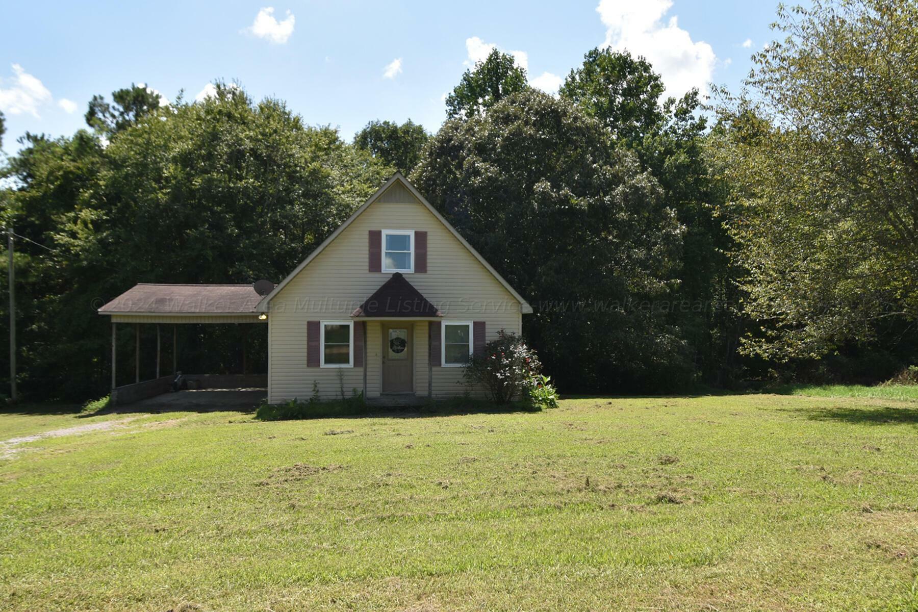 Property Photo:  100 County Rd 1125  AL 35179 