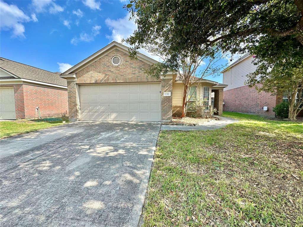 Property Photo:  2311 Urban Forest Court  TX 77386 