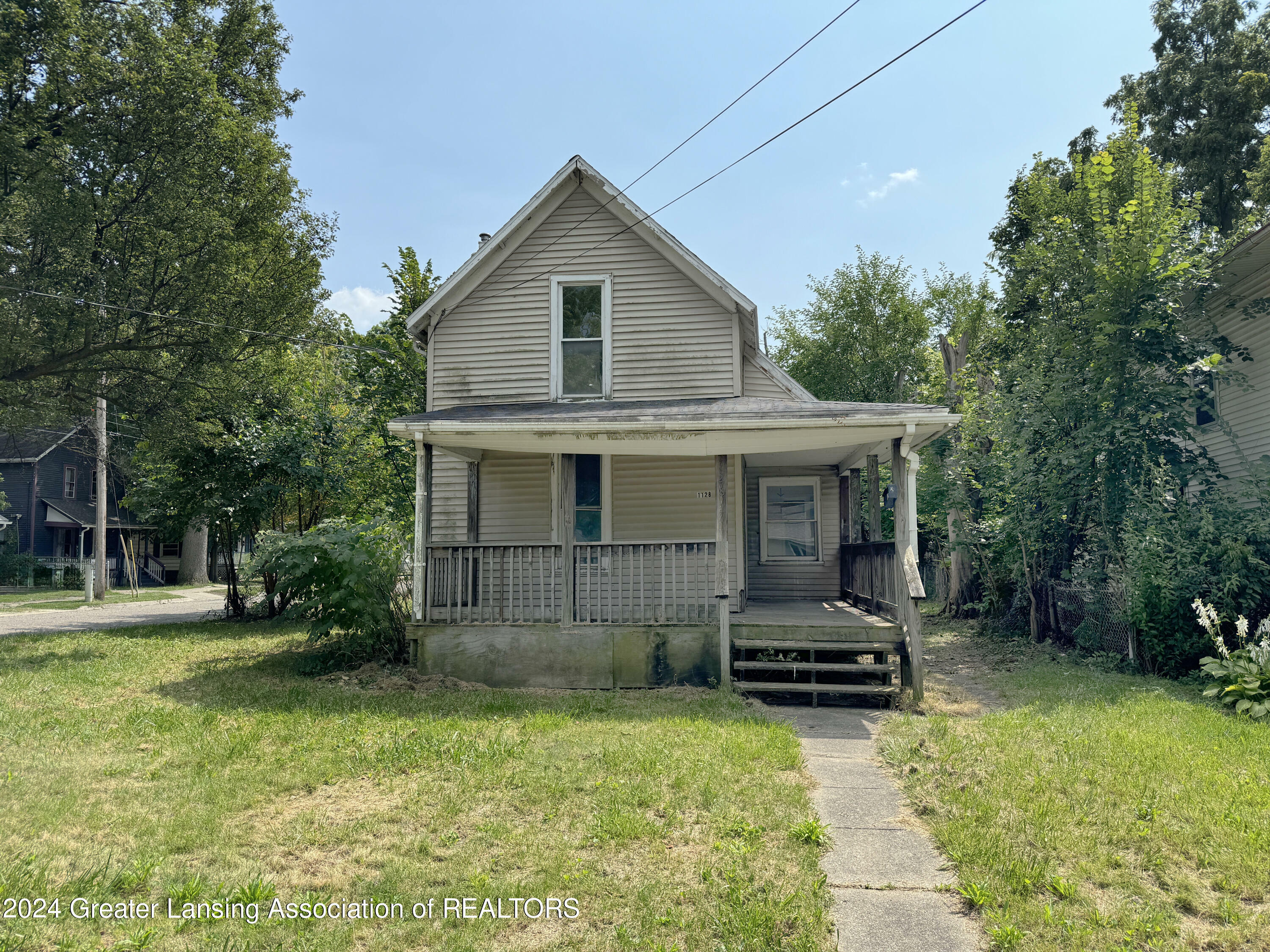 Property Photo:  1128 Hickory Street  MI 48912 