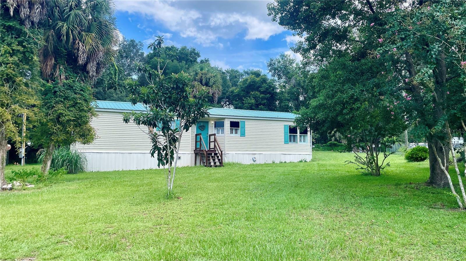 Property Photo:  10767 SE 130th Lane  FL 32179 