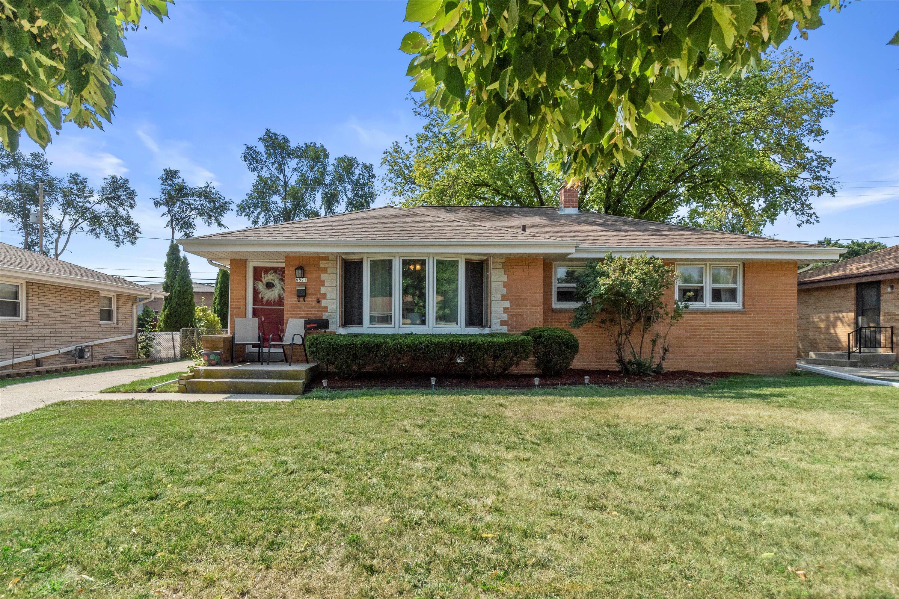 Property Photo:  8821 W Brentwood Ave  WI 53224 