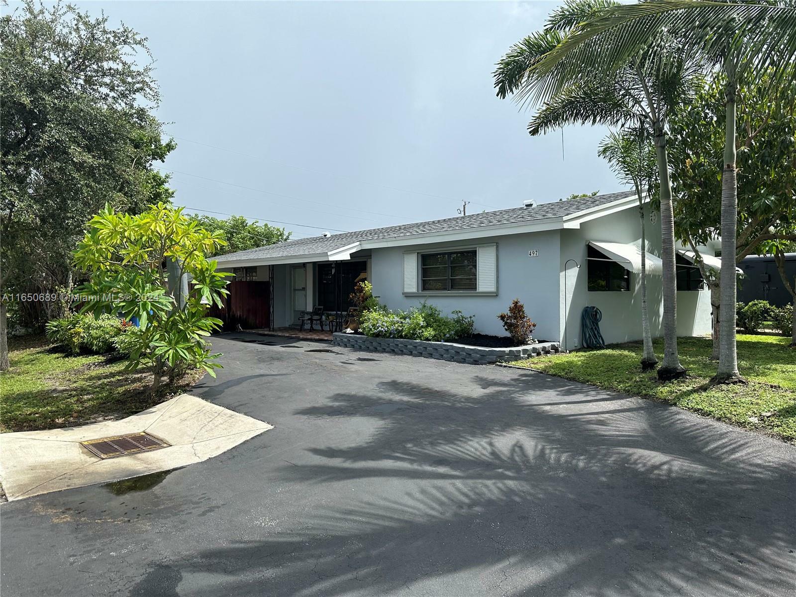 Property Photo:  497 NW 47th Ct  FL 33309 