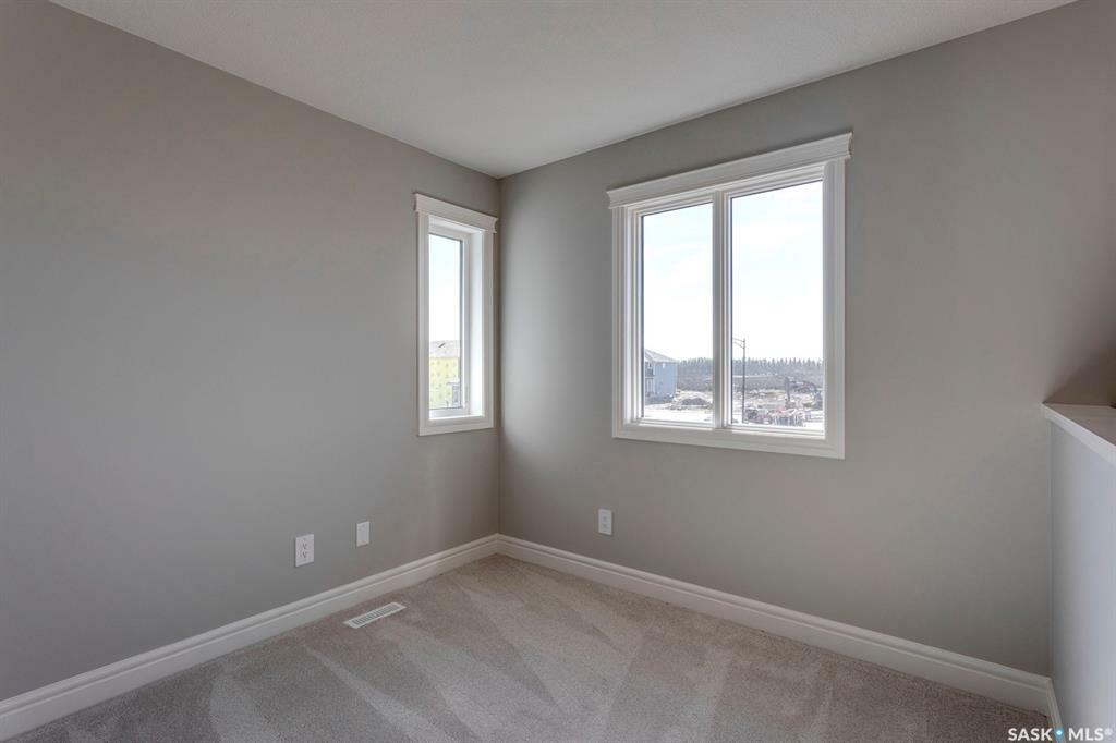 Property Photo:  320 Myles Heidt Lane  SK S7W 1J2 