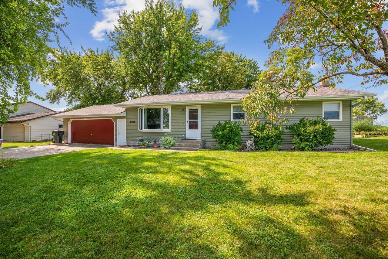 Property Photo:  212 3rd Avenue NW  MN 55370 