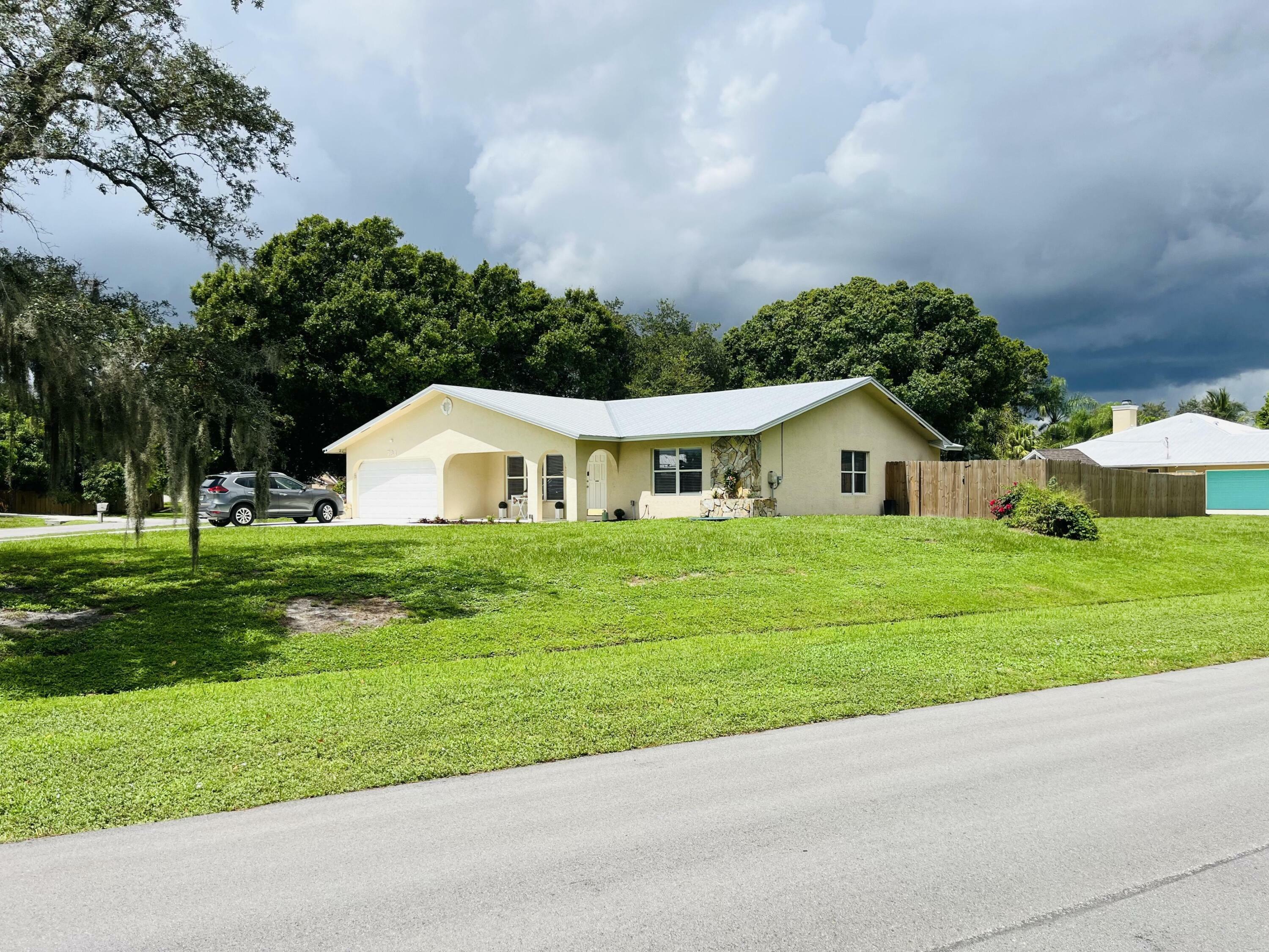 Property Photo:  781 SE Evans Avenue  FL 34984 