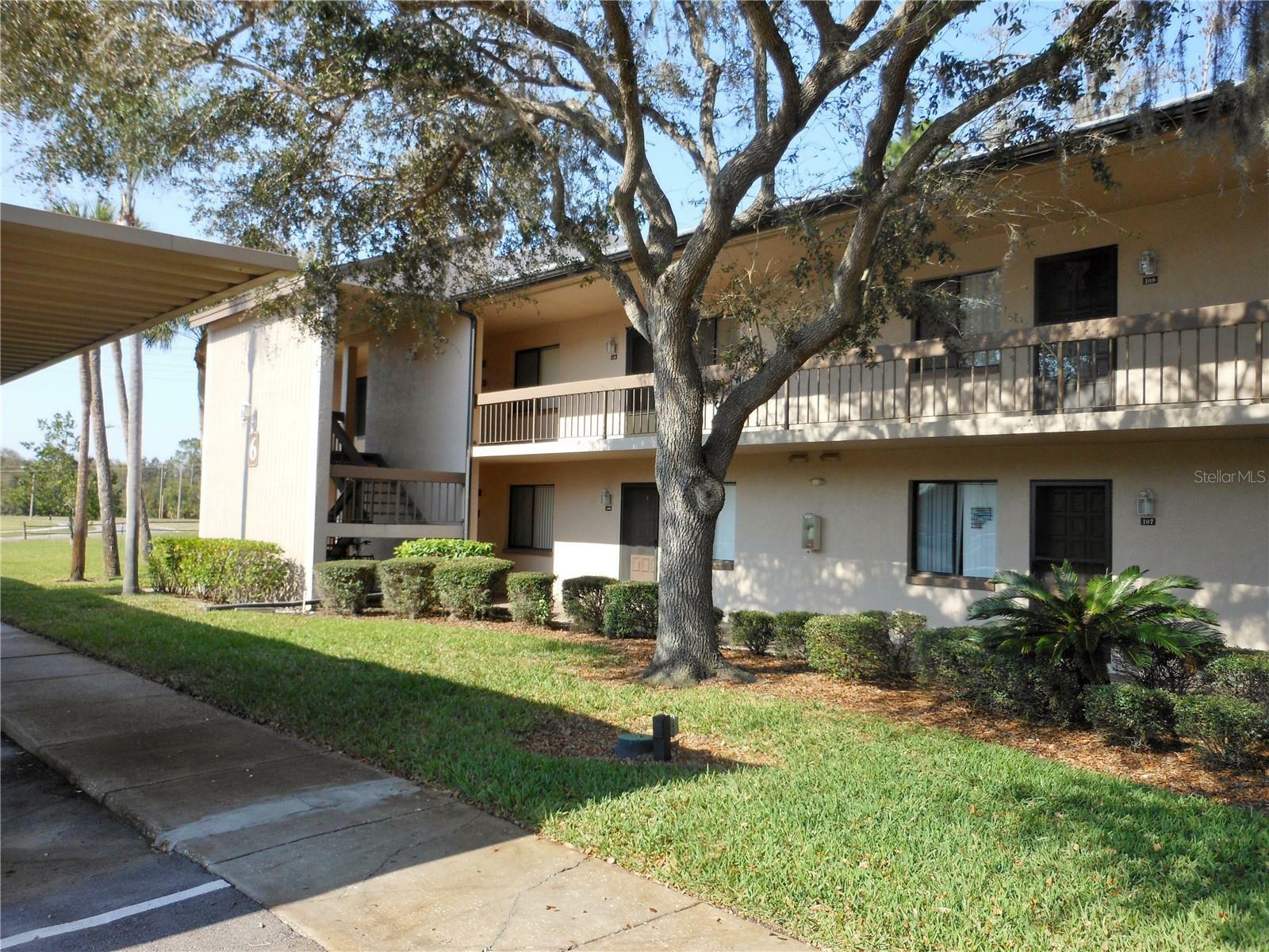 Property Photo:  112 Woodlands Court 112  FL 34677 