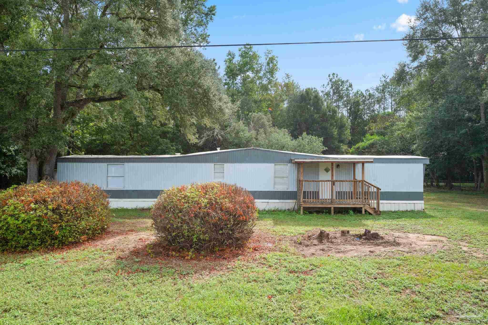 Property Photo:  7140 East Gate Rd  FL 32570 