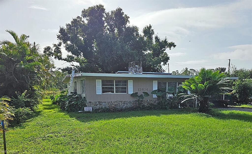 Property Photo: 12474 Poem Ave FL 33955