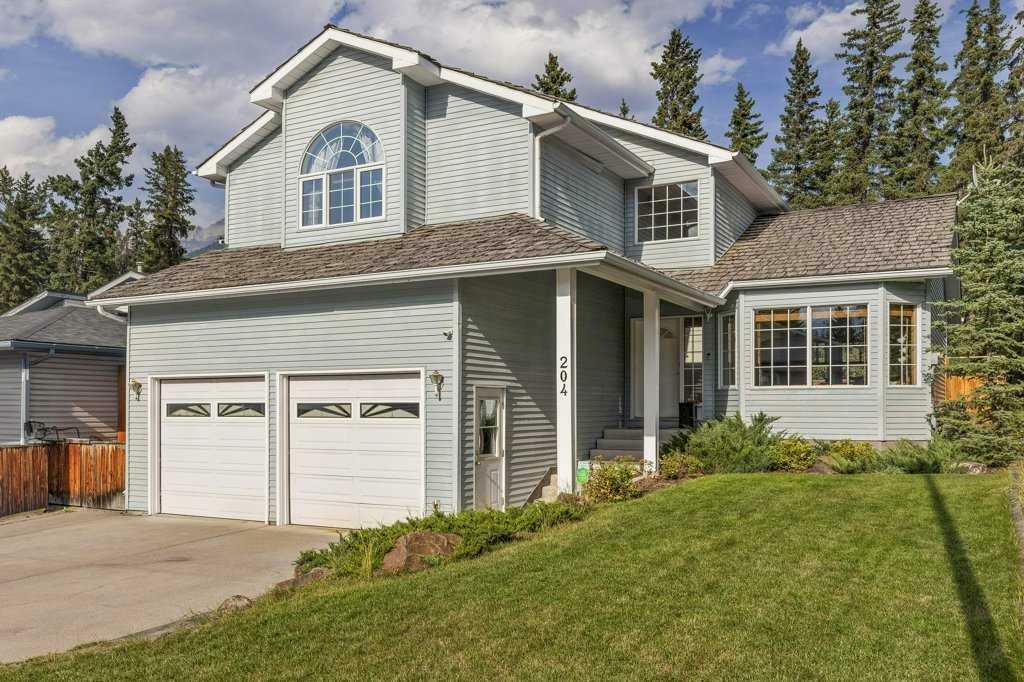 Property Photo:  204 Cougar Point Road  AB T1W 1A1 